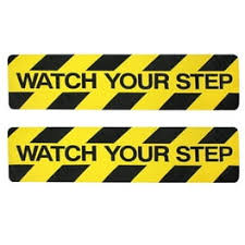 Striped Black/Yellow Watch Your Step 6 In. X 24 In. Sign