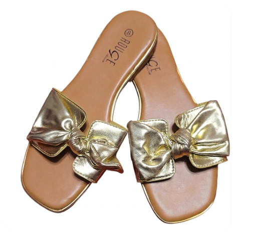 Rouge Helium | Metallic Gold Bow Flat Sandals - Size 8
