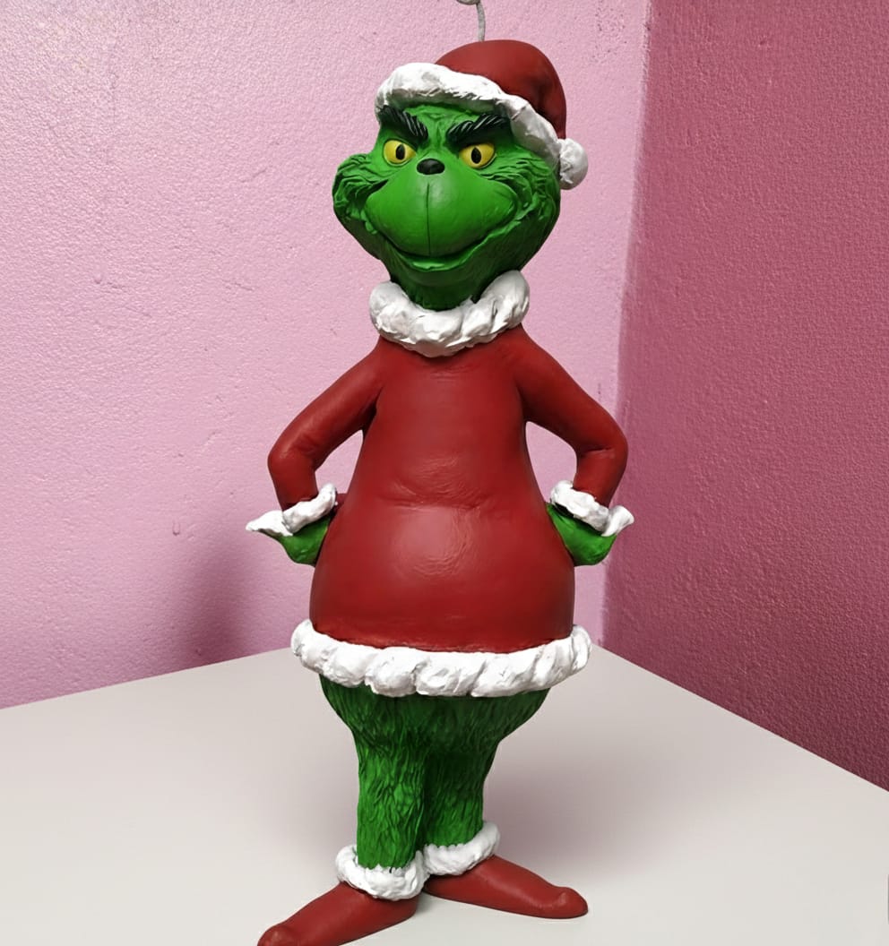Grinch sculpture scented candle